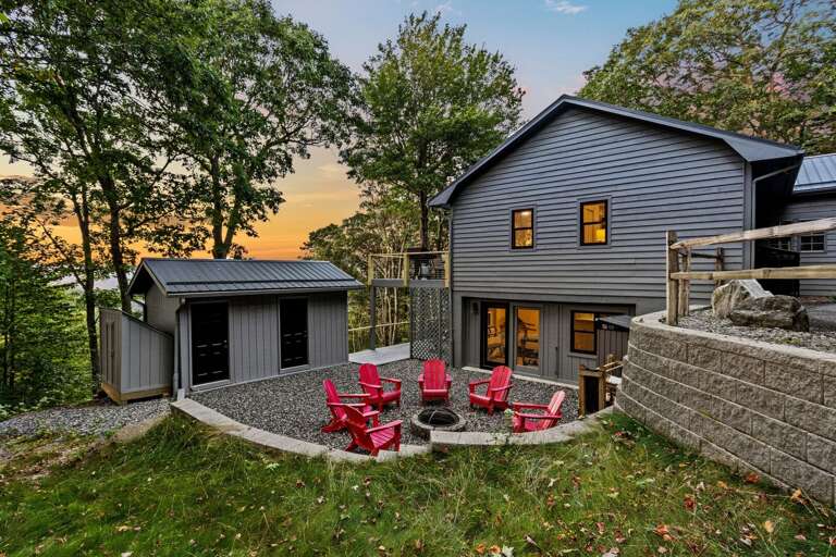 Fire Pit on the Gravel Patio with Custom Stone Retaining Wall
