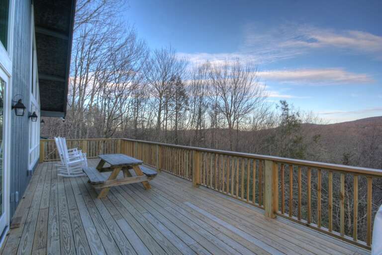 Majestic Mountain Haus Main Level View-side Deck with Outdoor Dining and Gas Grill