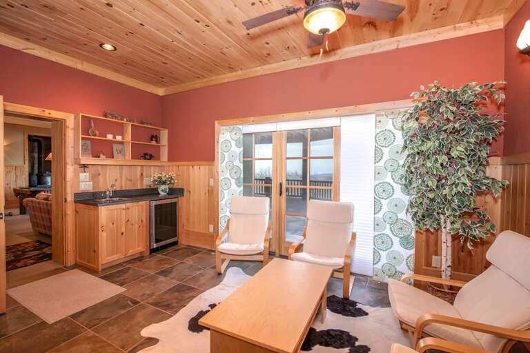 Downstairs sitting area with bar (wine cooler does not work)
