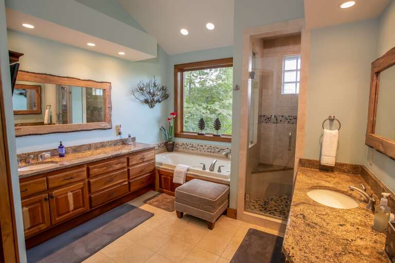 Ensuite Bathroom for Master Bathroom with Walk-in Shower, Tub, and Two Vanities