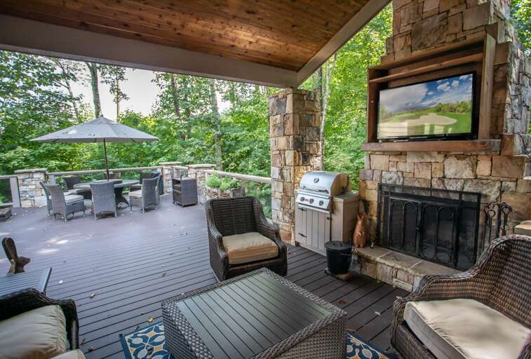 Outdoor Fireplace, Grill, and TV on Back Deck