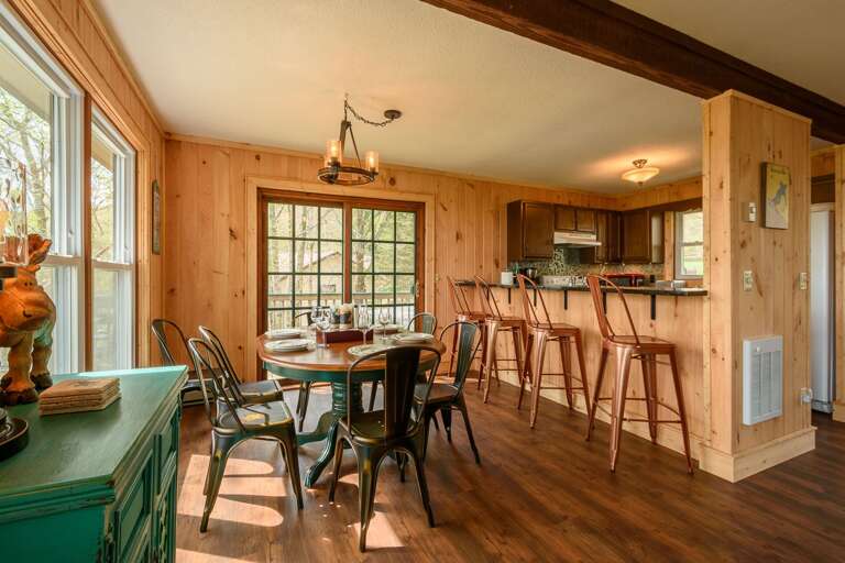 Bar Seating adds Four Dining Spots between Kitchen and Dining Area Bar Seating adds Four Dining Spots between Kitchen and Dining Area