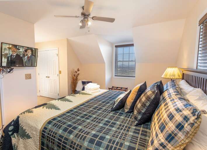 King bedroom with flatscreen TV