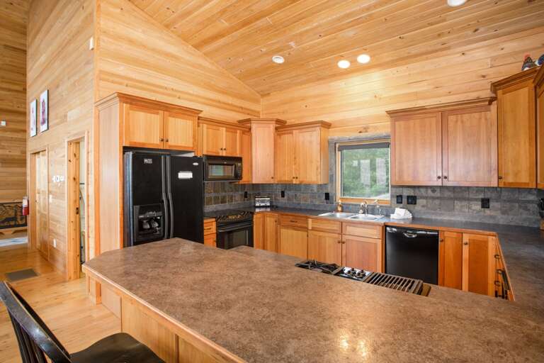 Spacious Kitchen with Modern Appliances Spacious Kitchen with Modern Appliances