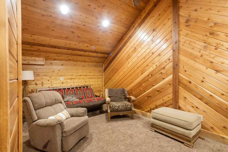 Futon and Lounge Chairs in the Movie Room