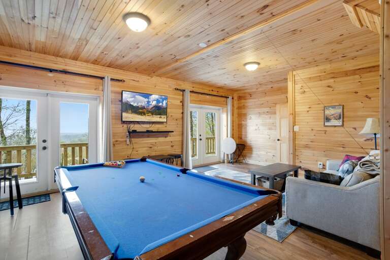 Eight-Foot Slate Pool Table and TV in the Lower Level Game Room