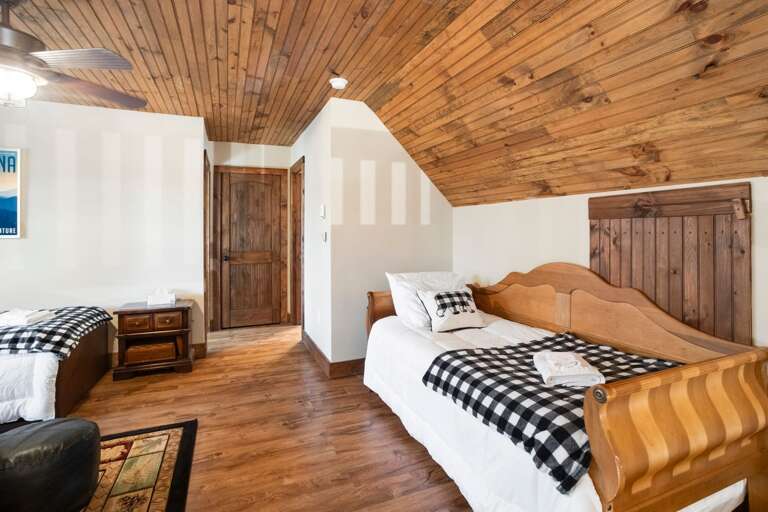 Upstairs Loft with Tongue in Groove Ceilings, 3 Twin beds and 1 Twin Trundle Bed