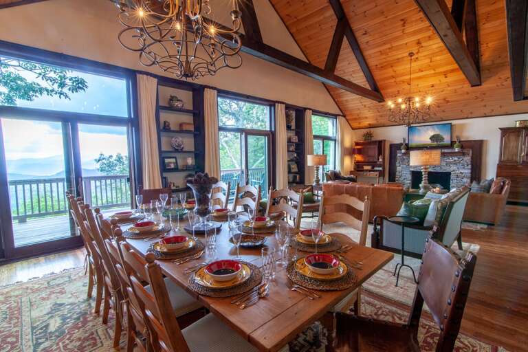 Dining and Great Room look out at Mountain Views through Huge Glass Doors Dining and Great Room look out at Mountain Views through Huge Glass Doors