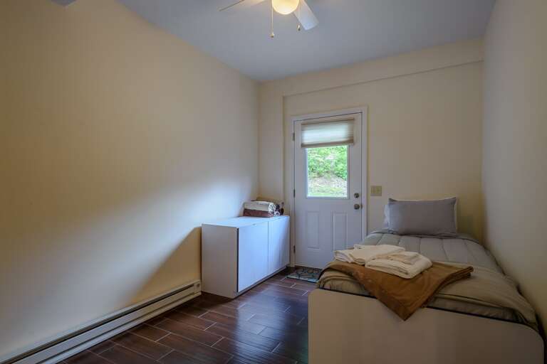 1 of 2 Bedrooms on Lower Level with Twin Bed and Trundle Bed, Access to Hot Tub behind the barn 1 of 2 Bedrooms on Lower Level with Twin Bed and Trundle Bed, Access to Hot Tub behind the barn