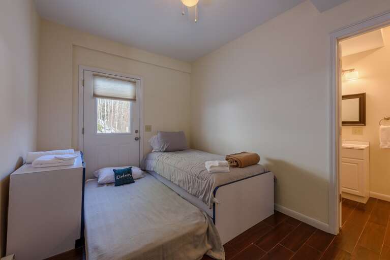 Lower Level Bedroom with Twin, Trundle Beds, Bathroom adjacent Lower Level Bedroom with Twin, Trundle Beds, Bathroom adjacent