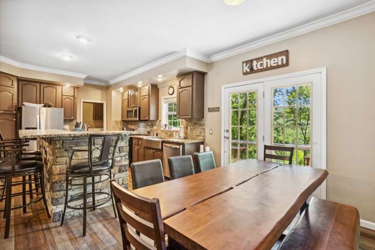 Dining Table Seats Eight with Additional Seating at the Kitchen Island Dining Table Seats Eight with Additional Seating at the Kitchen Island