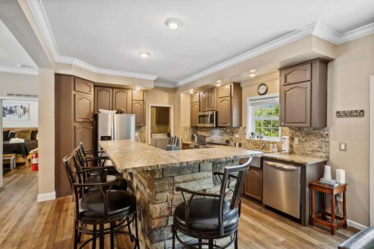 Kitchen with Granite Counters and Stainless Appliances Kitchen with Granite Counters and Stainless Appliances