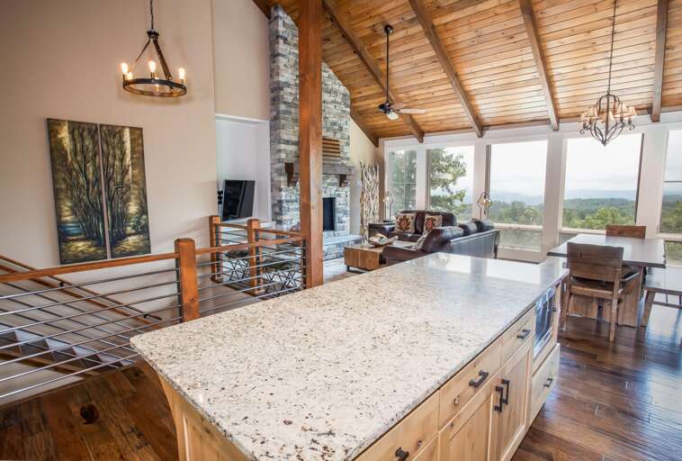 Large Central Granite Island in Kitchen with 4 Bar Stool Seats Large Central Granite Island in Kitchen with 4 Bar Stool Seats