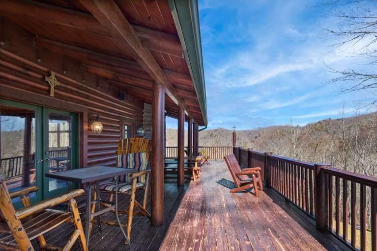 Lots of Seating Options and Picnic Table on Covered Deck