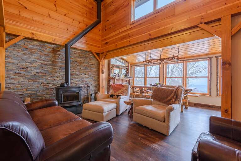 Great Room with Wood-Burning Wood Stove and Comfy Furniture