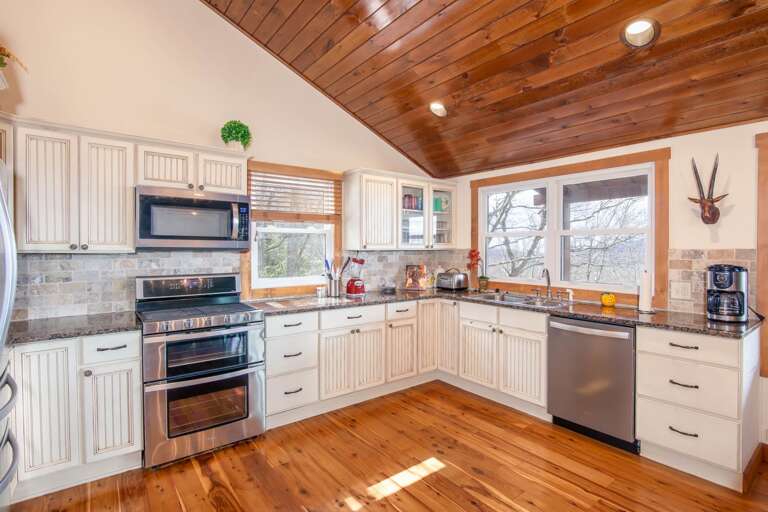 Full Kitchen with Granite Counters and Stainless Appliances Full Kitchen with Granite Counters and Stainless Appliances
