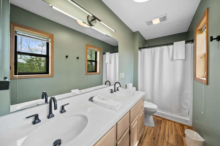 Ensuite Master Bathroom with Step-In Shower and Dual Sink Vanity