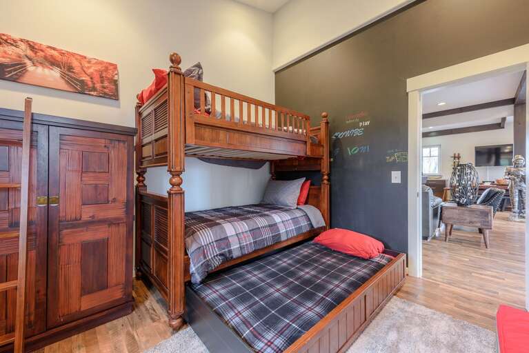 Bunk Bedroom on Main Level with Twin over Twin Bunkbed, and a Pull-out Twin Trundle Bed Bunk Bedroom on Main Level with Twin over Twin Bunkbed, and a Pull-out Twin Trundle Bed