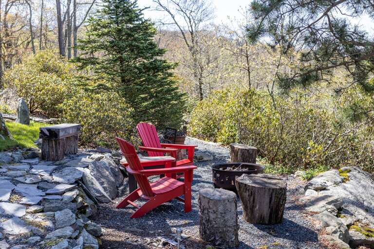 Fire Pit with Adirondack Chairs and Camp Out Feel