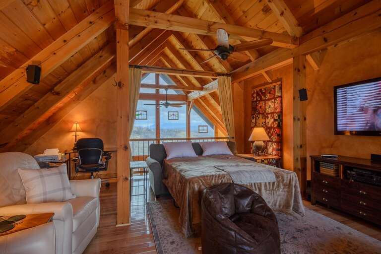 Loft Sleeping Area has Curtains for more Privacy Above the Great Room