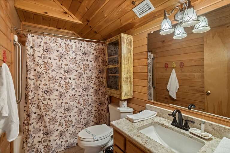 Full Loft Bathroom with Tub and Shower Combo