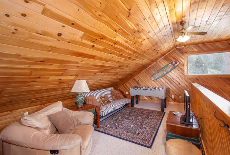 Sweet Retreat Foosball and TV in the loft as well as a futon that can sleep 2 more