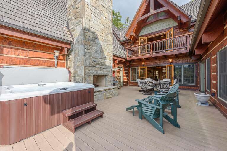 Outdoor Stone Wood-Burning Fireplace on Deck