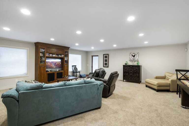 Huge Den and Game Room on Lower Level with Door out onto Deck with Napping Swing and Hot Tub