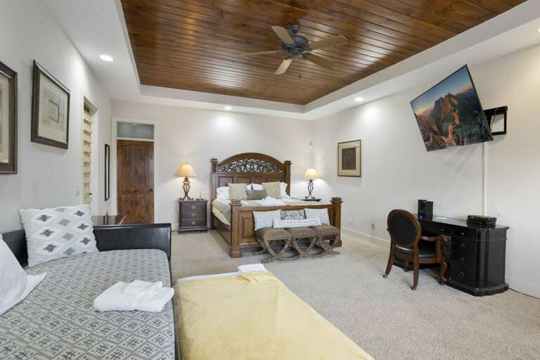 King Master Suite with 65" HDTV Mounted Over Desk