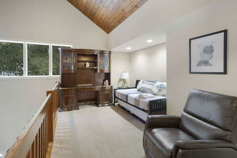 Loft with Desk, Recliner, and a Daybed with a Trundle