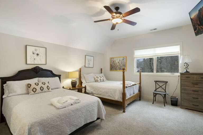 Upstairs Suite with Two Queen Beds, HDTV, Ensuite Full Bathroom, and Second Bunk Room