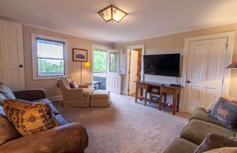 Downstairs Den with HDTV and Comfy Furnsihings