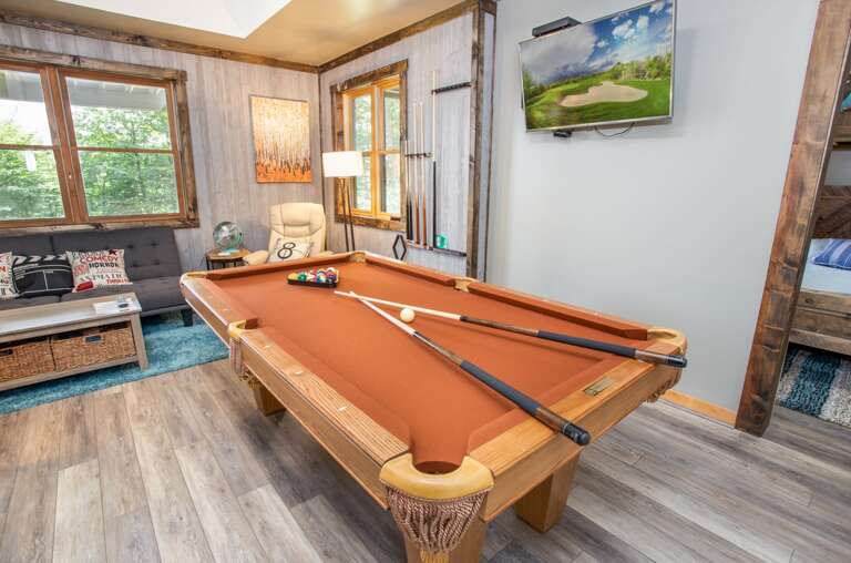 Den and Game Room on Lower Level with Wall-mounted HD Smart TV Den and Game Room on Lower Level with Wall-mounted HD Smart TV