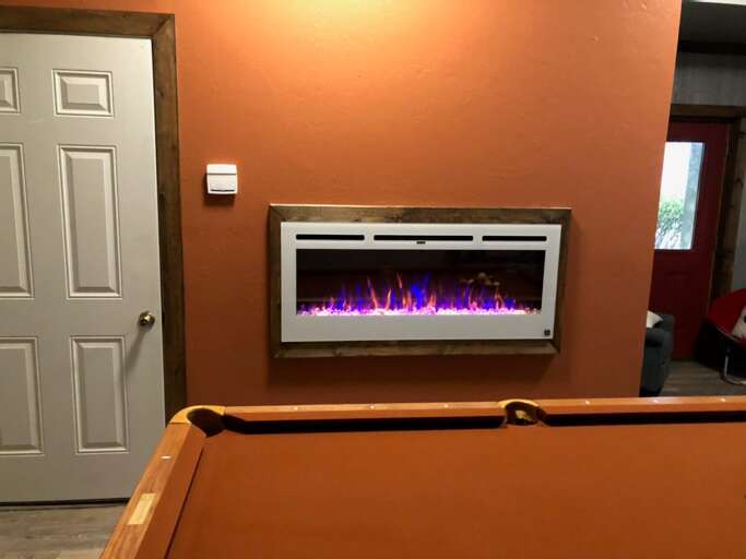 Electric Fireplace next to Pool Table Electric Fireplace next to Pool Table