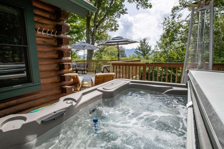 Hot Tub on Rear Deck, Look out at Mountain Views while Soaking! Hot Tub on Rear Deck, Look out at Mountain Views while Soaking!