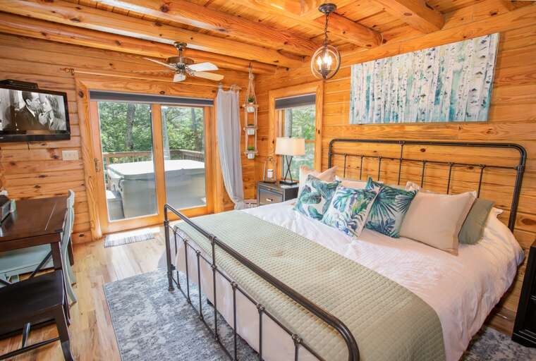 King Master Suite on Main Level with HD Smart TV and Glass Door to Views, Deck, and Hot Tub King Master Suite on Main Level with HD Smart TV and Glass Door to Views, Deck, and Hot Tub