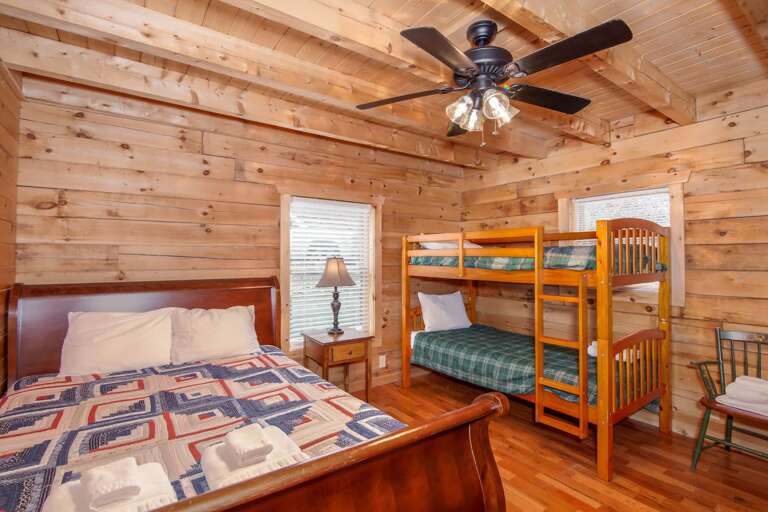 Twin Hollows upstairs bedroom with queen bed and twin/twin bunk bed Twin Hollows upstairs bedroom with queen bed and twin/twin bunk bed
