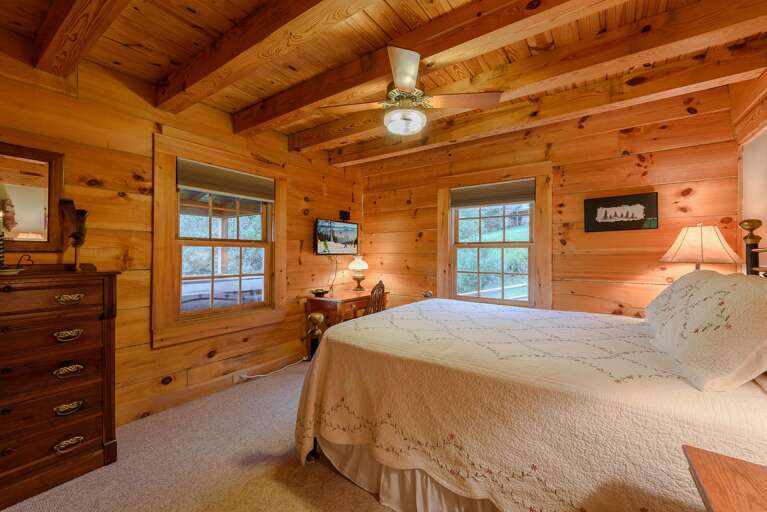 Main Level Queen Bedroom with HDTV Main Level Queen Bedroom with HDTV