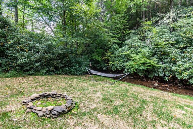 Fire Ring and Hammock in Backyard by the Creek Fire Ring and Hammock in Backyard by the Creek