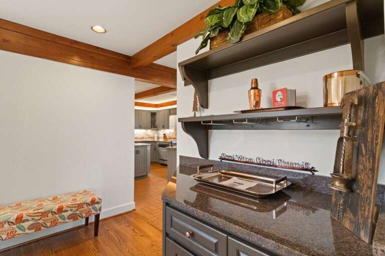Dry Bar with Wine Glasses Located in the Hallway