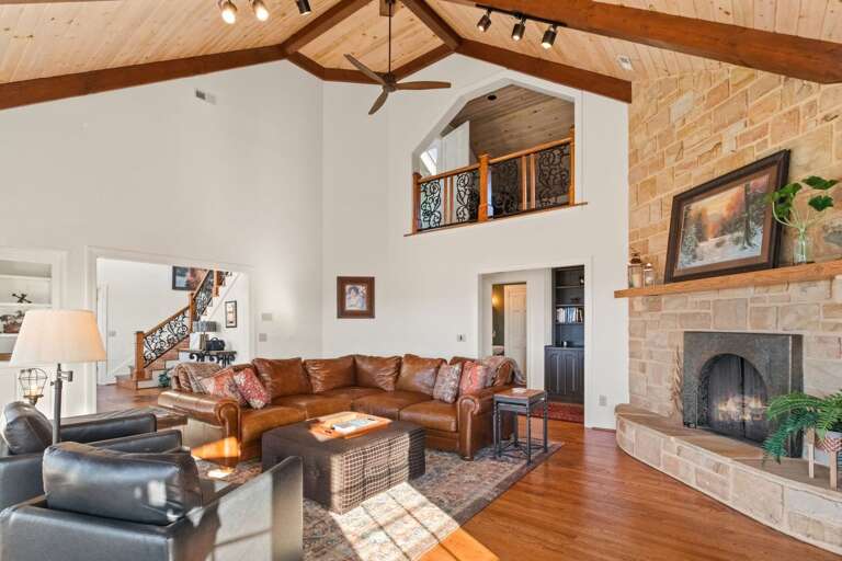 Plenty of Comfy Seating for Large Groups in the Living Room with Loft Above