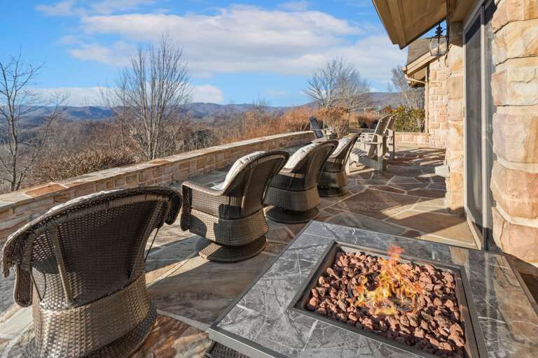 Relax on the Terrance with Comfy Chairs and Gas Fire Table