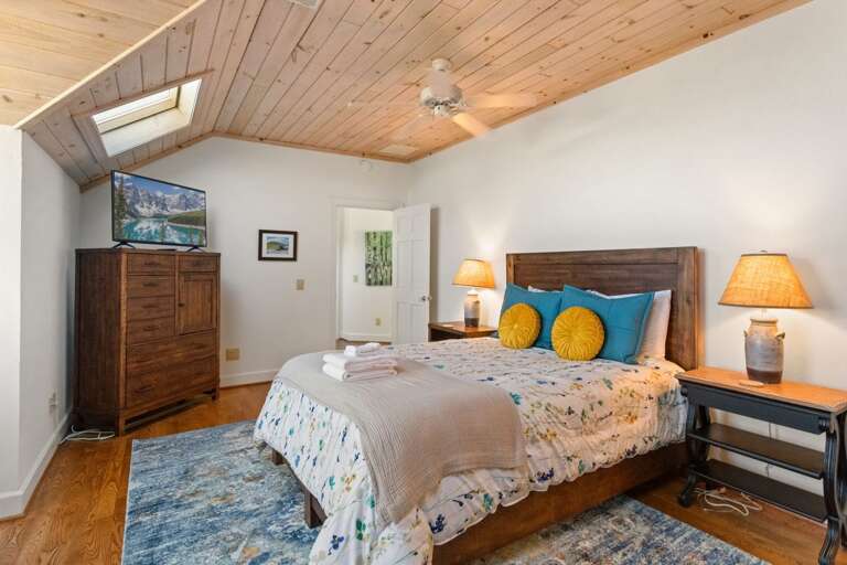 Upstairs Queen Bedroom with a TV