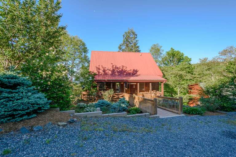 Gravel Parking with Ramp Leading to Front Door