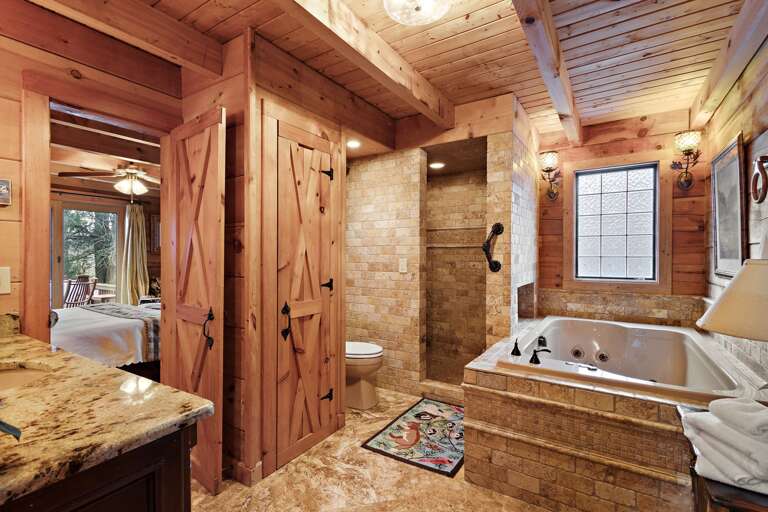Large Master Bathroom with Custom Tile and Flooring