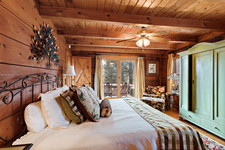 Lower Level Master Bedroom with King Bed and Deck Access