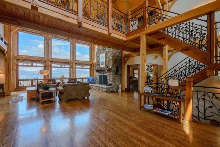 Huge Windows in the Great Room Frame the Breathtaking Mountains in the Distance Huge Windows in the Great Room Frame the Breathtaking Mountains in the Distance