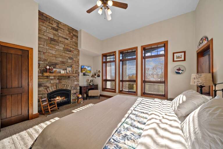Lower Level King Bedroom with Stone Fireplace