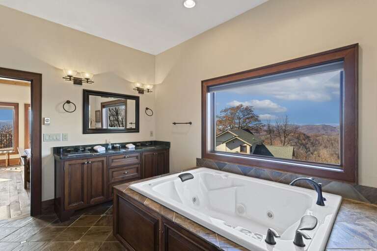 Master Bath includes Large Jetted Tub with Mountain Views Master Bath includes Large Jetted Tub with Mountain Views
