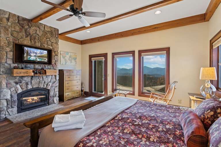 Master Suite Features a Gas Fireplace, Spectacular Views, and a Gas Fireplace Master Suite Features a Gas Fireplace, Spectacular Views, and a Gas Fireplace